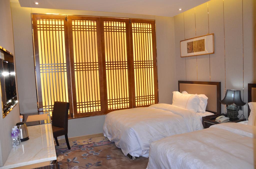 Beijing Palace International Hotel Pekín Habitación foto