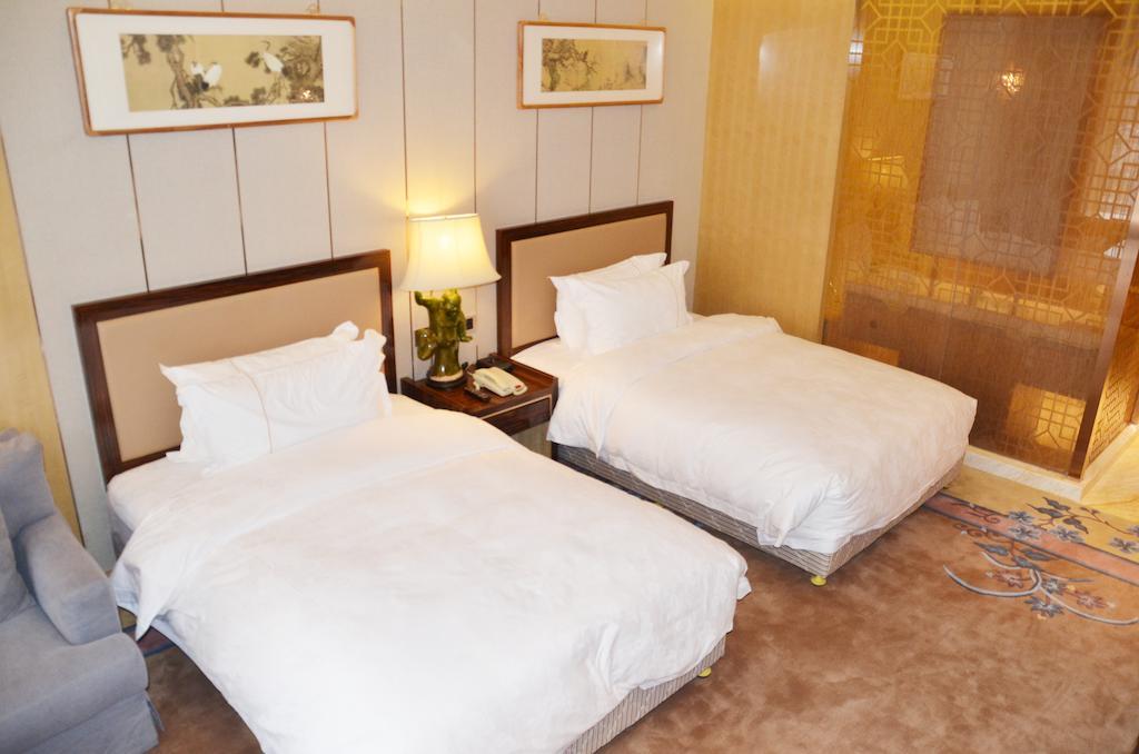 Beijing Palace International Hotel Pekín Habitación foto